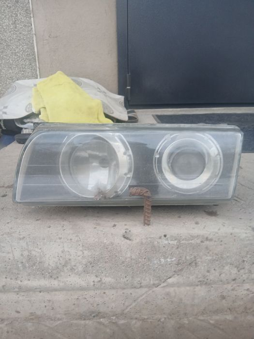 Левая передняя фара BMW 3 й серии