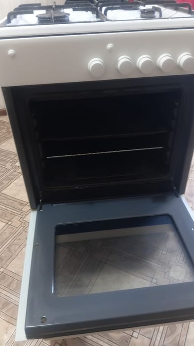 Газовая плита с духовым шкафом б/у.