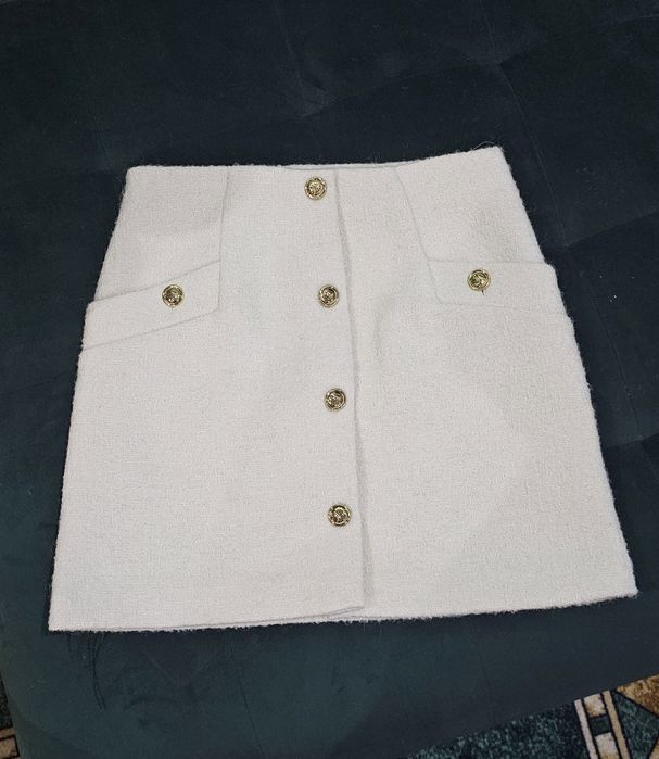 Пола Sandro със златни детайли