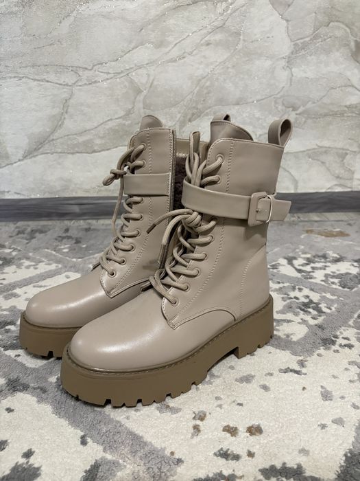 Продам новые зимние ботинки