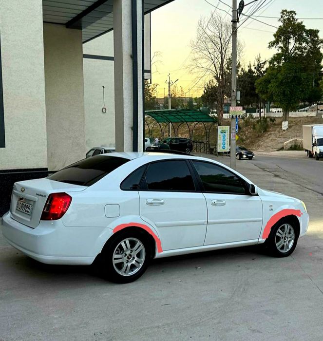 Ласетти 1,6 автомат 2013. Бензин.