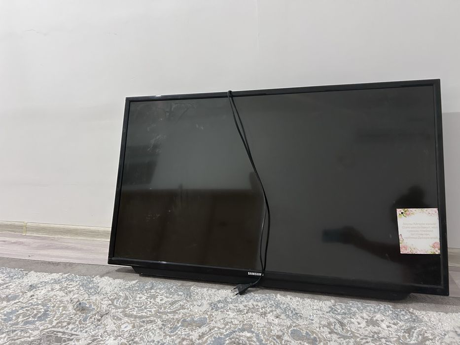 Телевизор почти новый