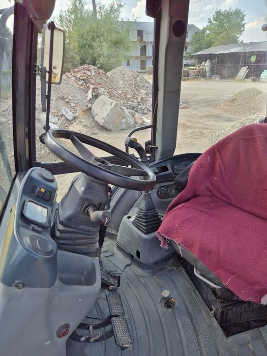 Buldoexcavator New holland an 2006