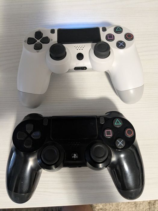 PS4 Pro 1 TB + 2 controlere + dock + 17 Jocuri