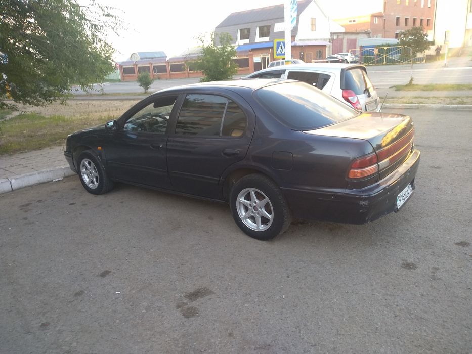 Ниссан костанай. Toyota Carina t190. Toyota Carina 190. Nissan maxima 1995.