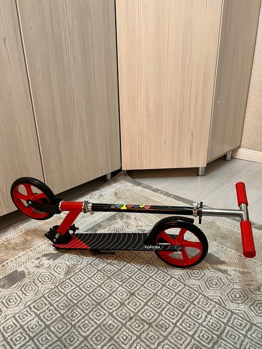 Новый самокат не использованный