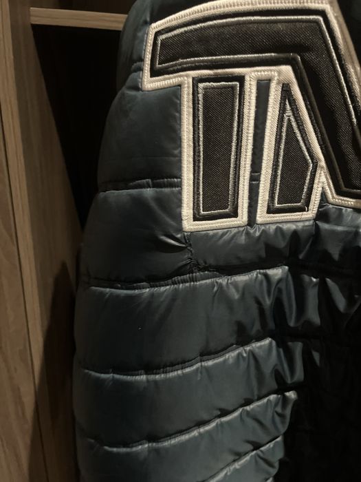 Безрукавка TMT.