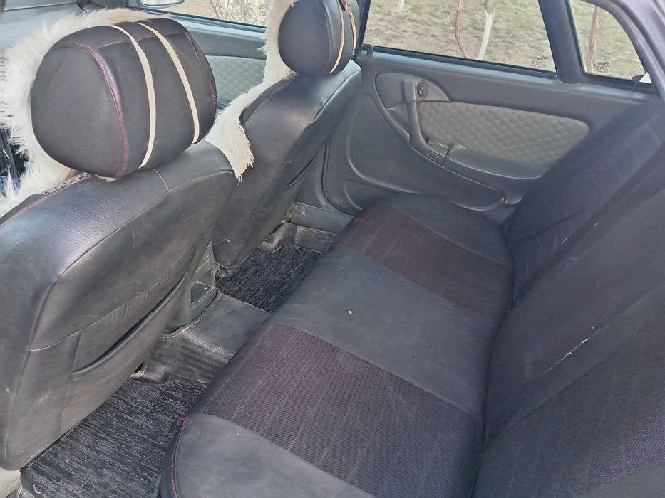 Машина сотилади холати яхши, метан бор, полик чехол,