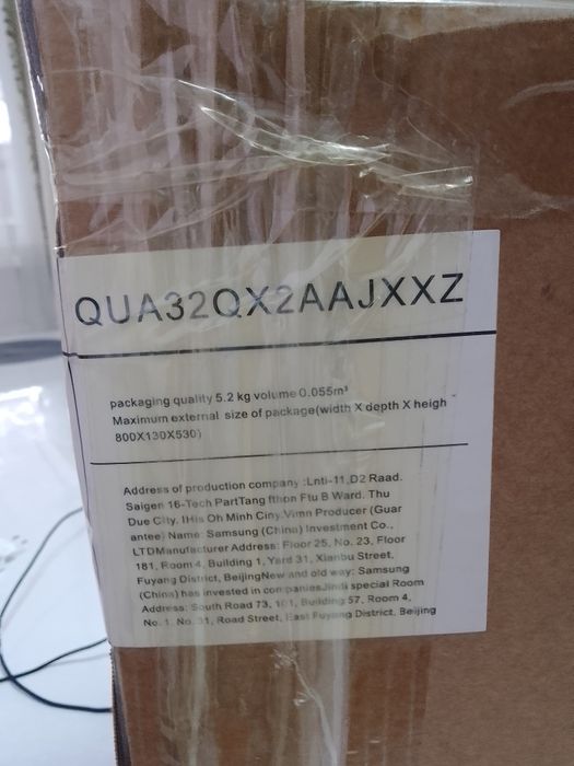 Новый телевизор в коробке с чехлом