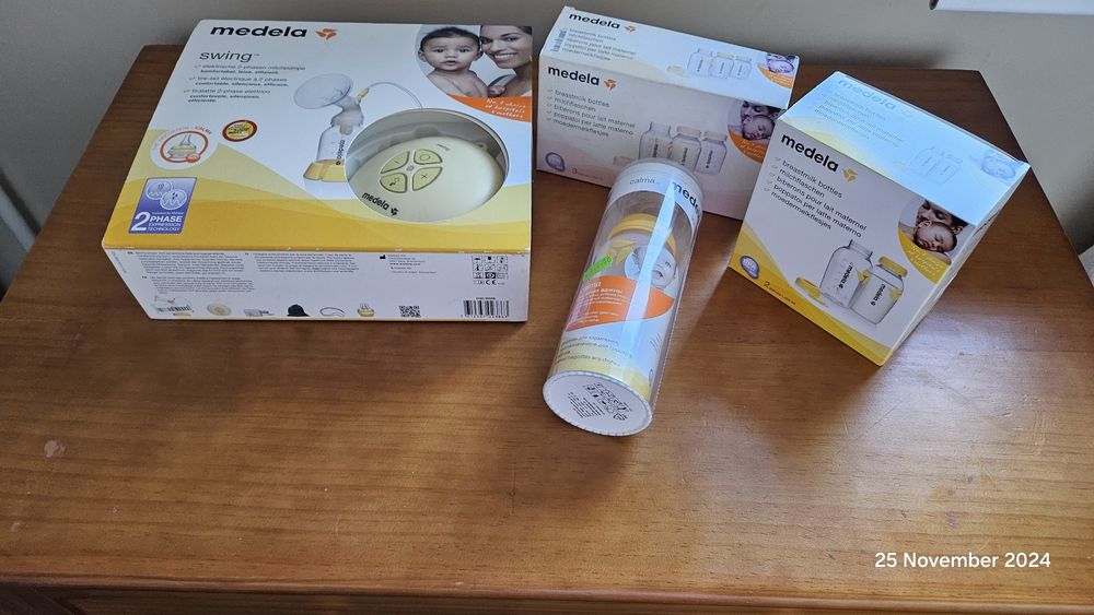 Pompă electrică Medela + biberoane