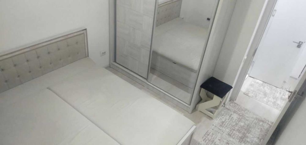 In the Yashnabad district, a two-room apartment is for rent.