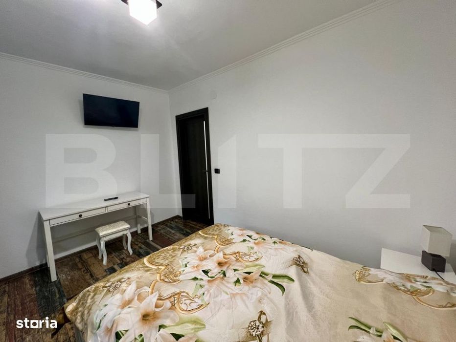 Apartament cu 2 camere, parter, centrala si AC, zona centrala