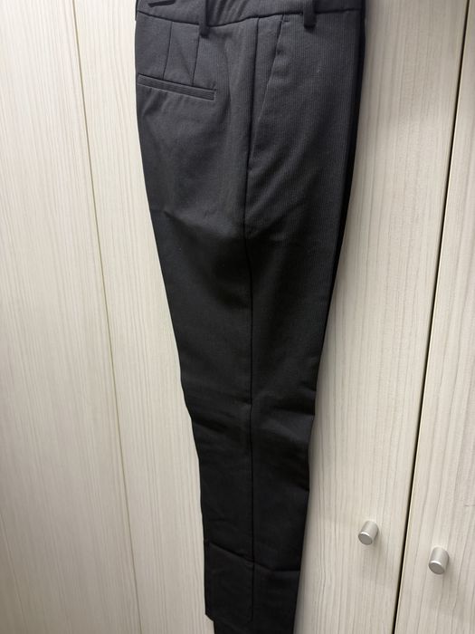 Pantaloni dama din stofa cu dungi Zara