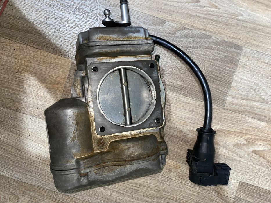 Дроссельная заслонка