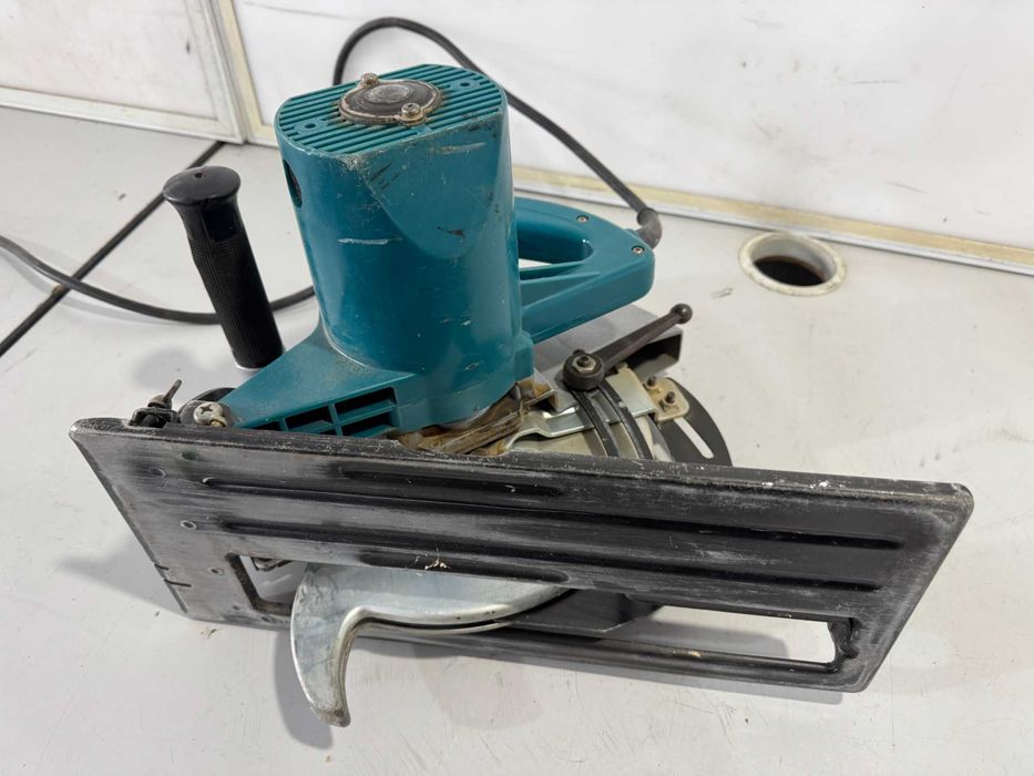 Ръчен циркуляр - Makita 1380 W / 235 mm