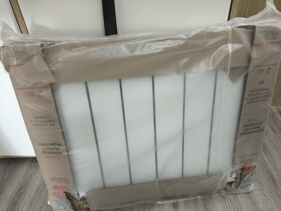 Новый радиатор алюминиевый