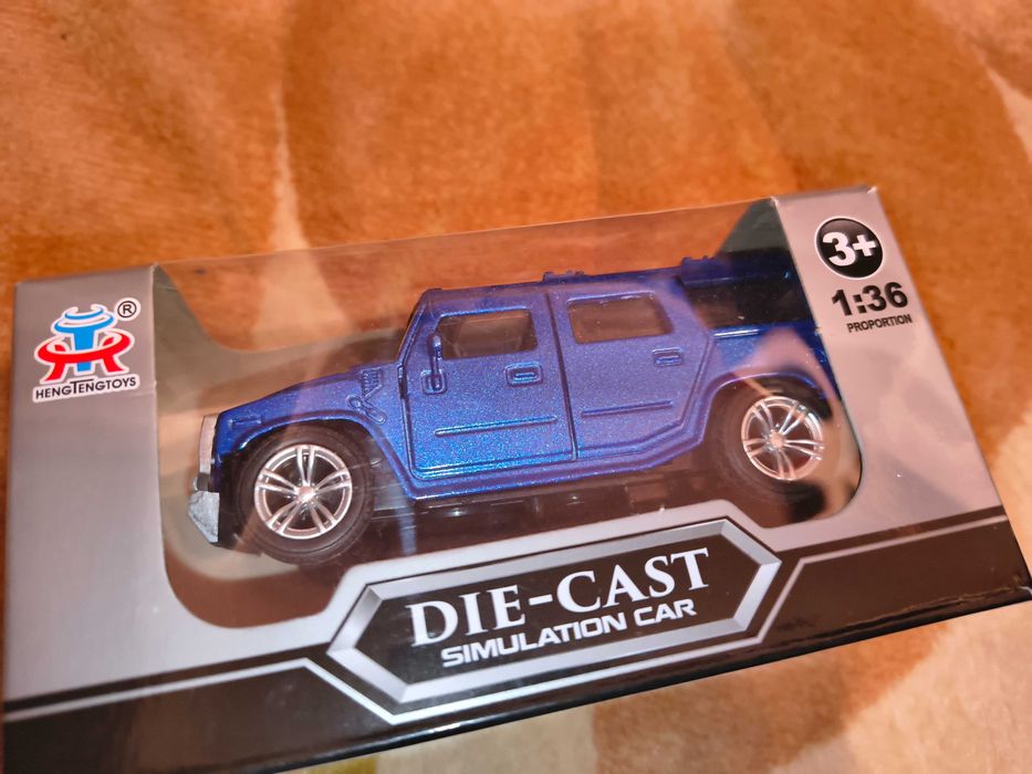 Jeep de jucărie metalic Die Cast pe albastru