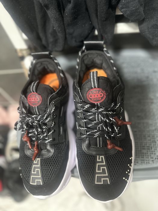 Adidasi versace chain reaction