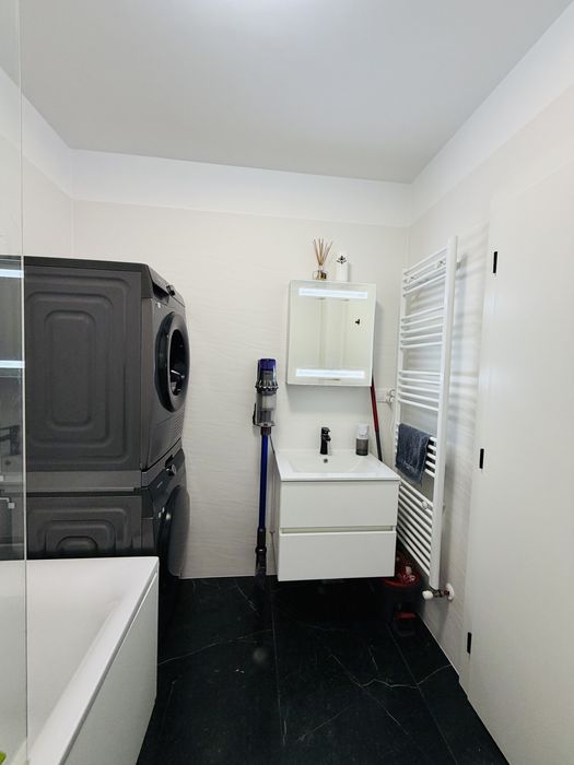 Apartament 2 camere + grădină proprie 70 mp + 2 locuri de parcare