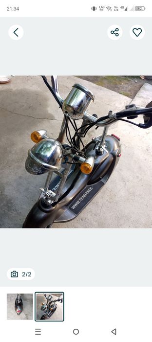 Trotineta electrica cu șa