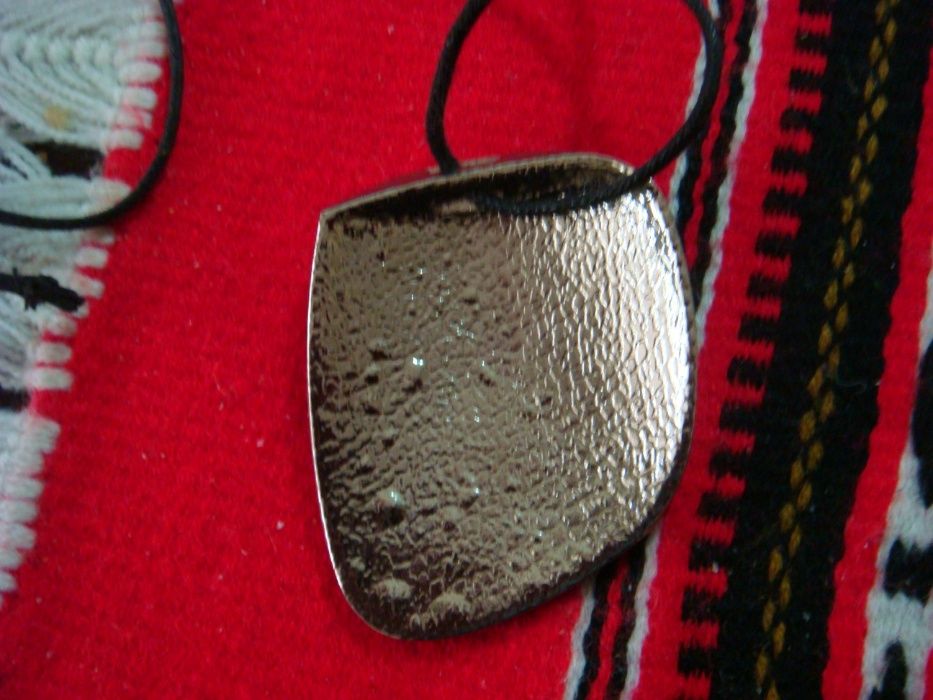 Medalion in forma de scoica