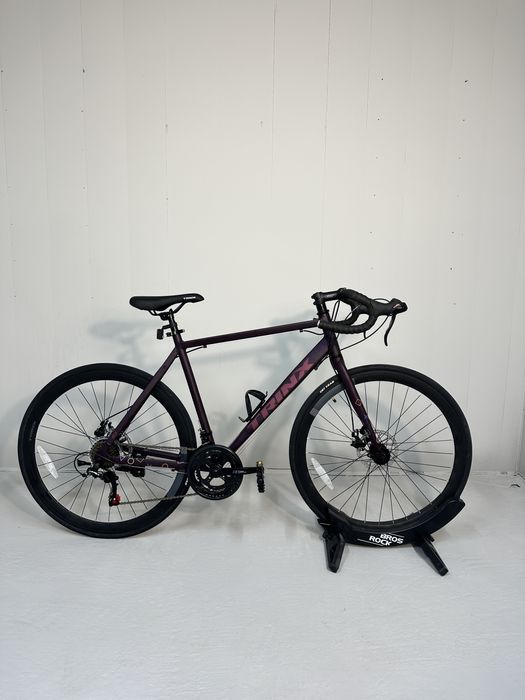 Шоссейный велосипед новый Trinx