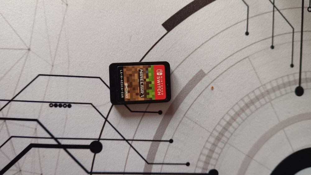 Nintendo Switch Lite coral blue+Minecraft și card SD de 128 gb