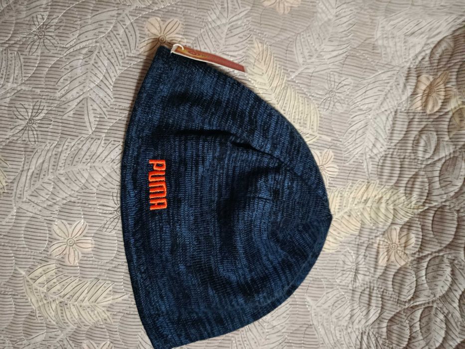 Продам  шапку   двусторония  в  нутрий  флис