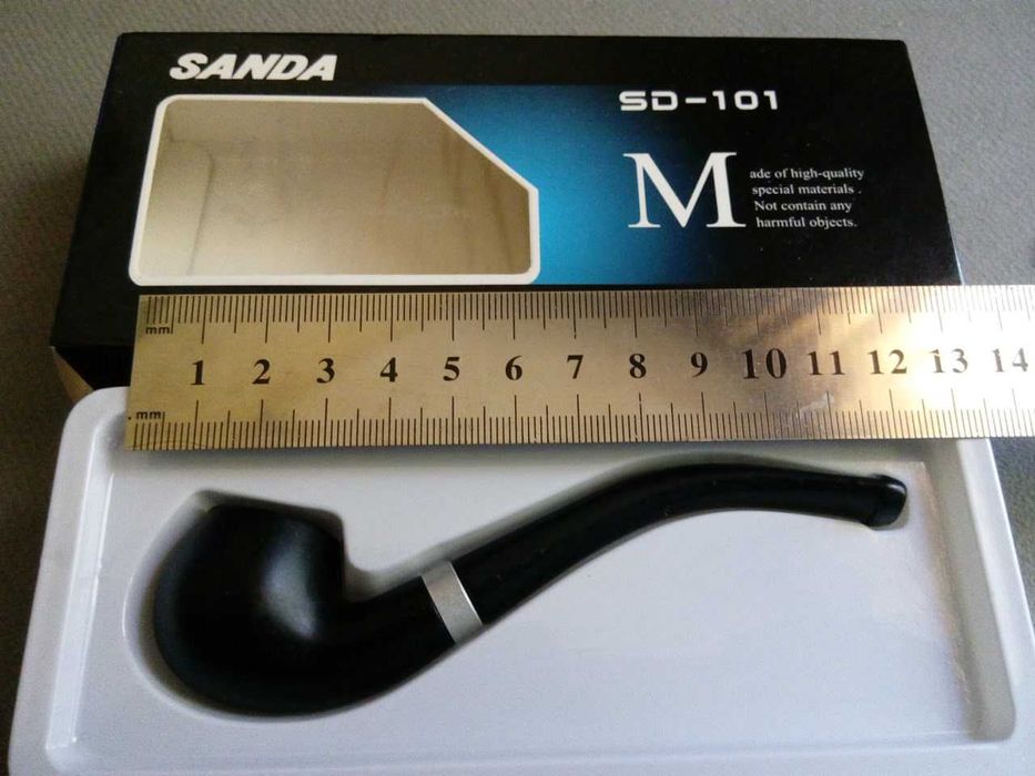 курительные трубки в запечатанных коробках.