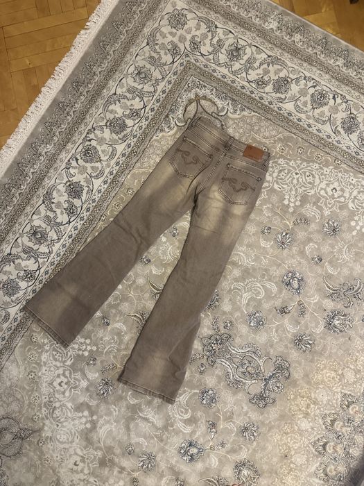 Джинсы bootcut женские