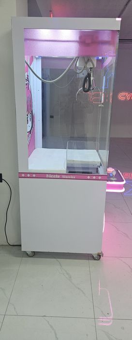 Игровой аппарат хватайка