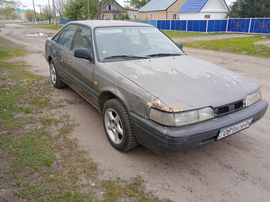 Мазда 626 gd  на полном ходу