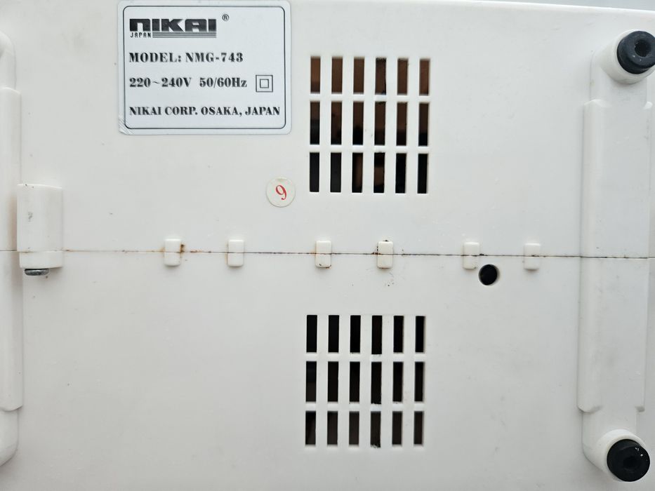 Продам электромясорубку  NIKAI NMC-743