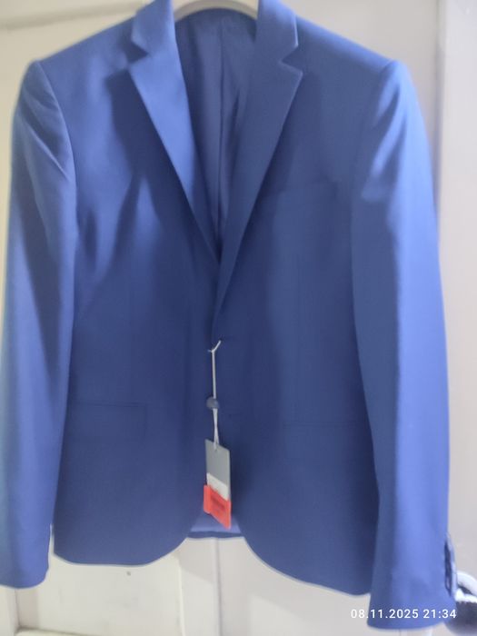 Мужские костюмы новые