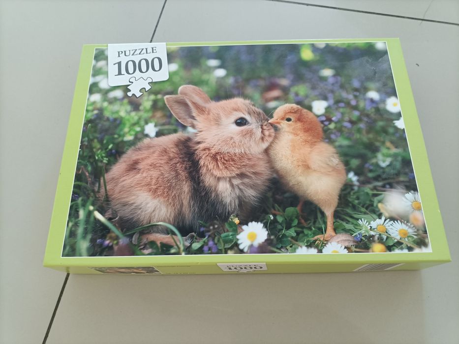 Puzzle de 1000 de piese - Iepuraș drăguț în iarbă
