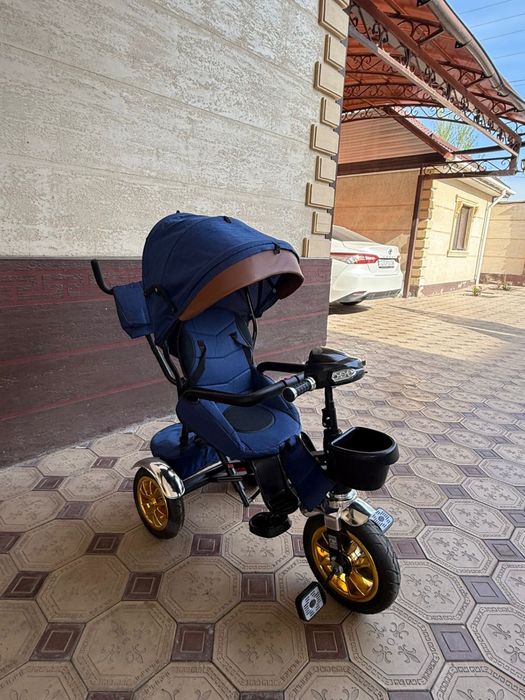 Продам трехколяску новый