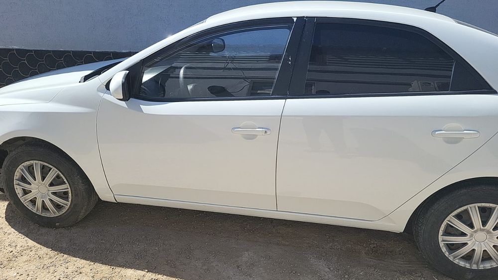 Kia cerato 2012 белый