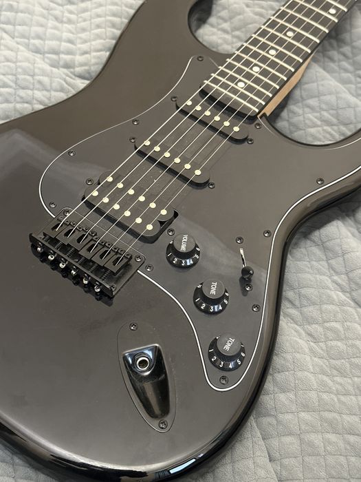 Гитара с комбоуселителем