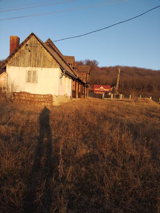 Vand teren intravilan cu constructie 48000 euro neg