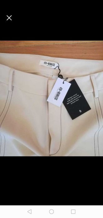 Широк бежов дамски панталон