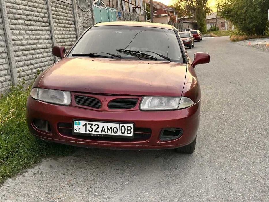 митсубиси каризма