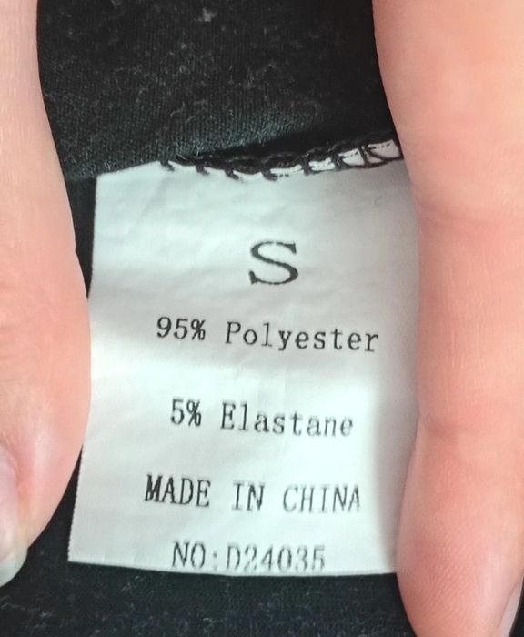 Top fără mâneci ce se leagă pe talie