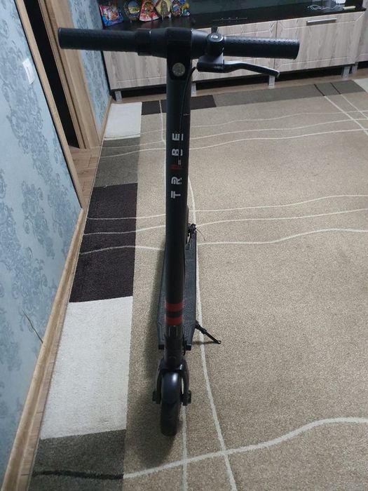 Электро самокат фирма Tride