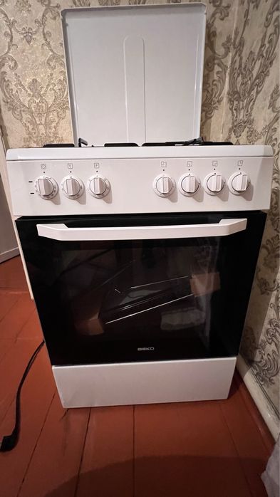 Продам комбинированую газ плиту