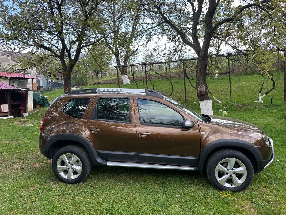Dacia Duster Prestige 2015 4x4 1.6 benzina Navi/Incalzire scaune/Piele