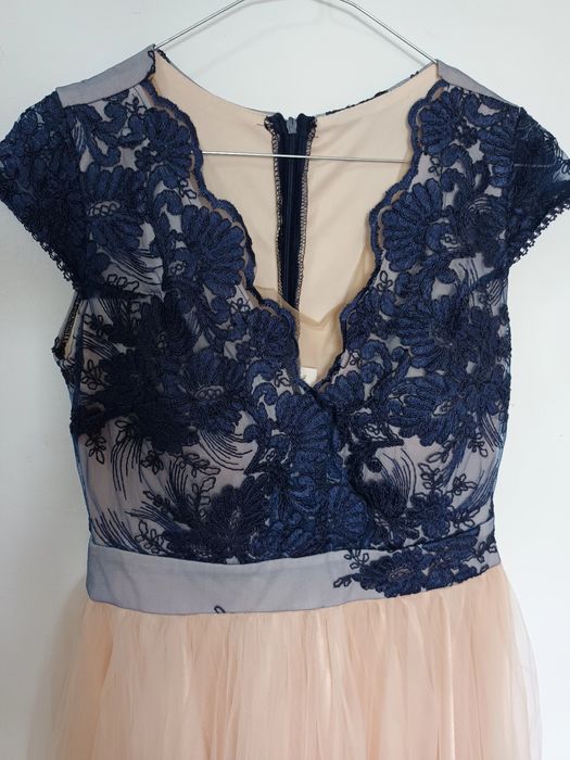 Vand rochita scurta marime L  impecabila.