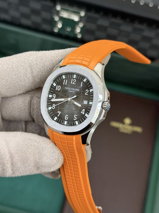 Patek Philippe Aquanaut – Black Dial, Orange Rubber Strap
