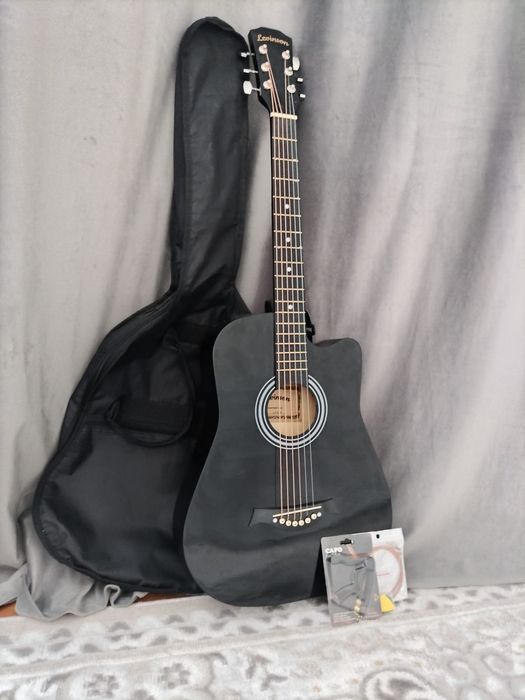 Жаңа акустикалық гитара сатылады