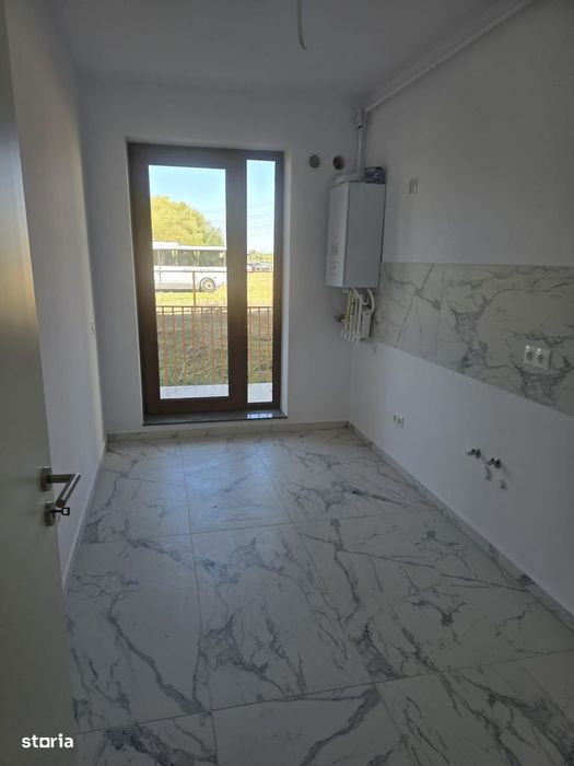 Apartament cu 2 camere , grădină 190mp + parcare