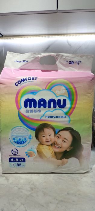 Подгузники Manu.